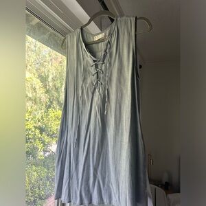 Gently worn. Denim color. Sleeveless dress